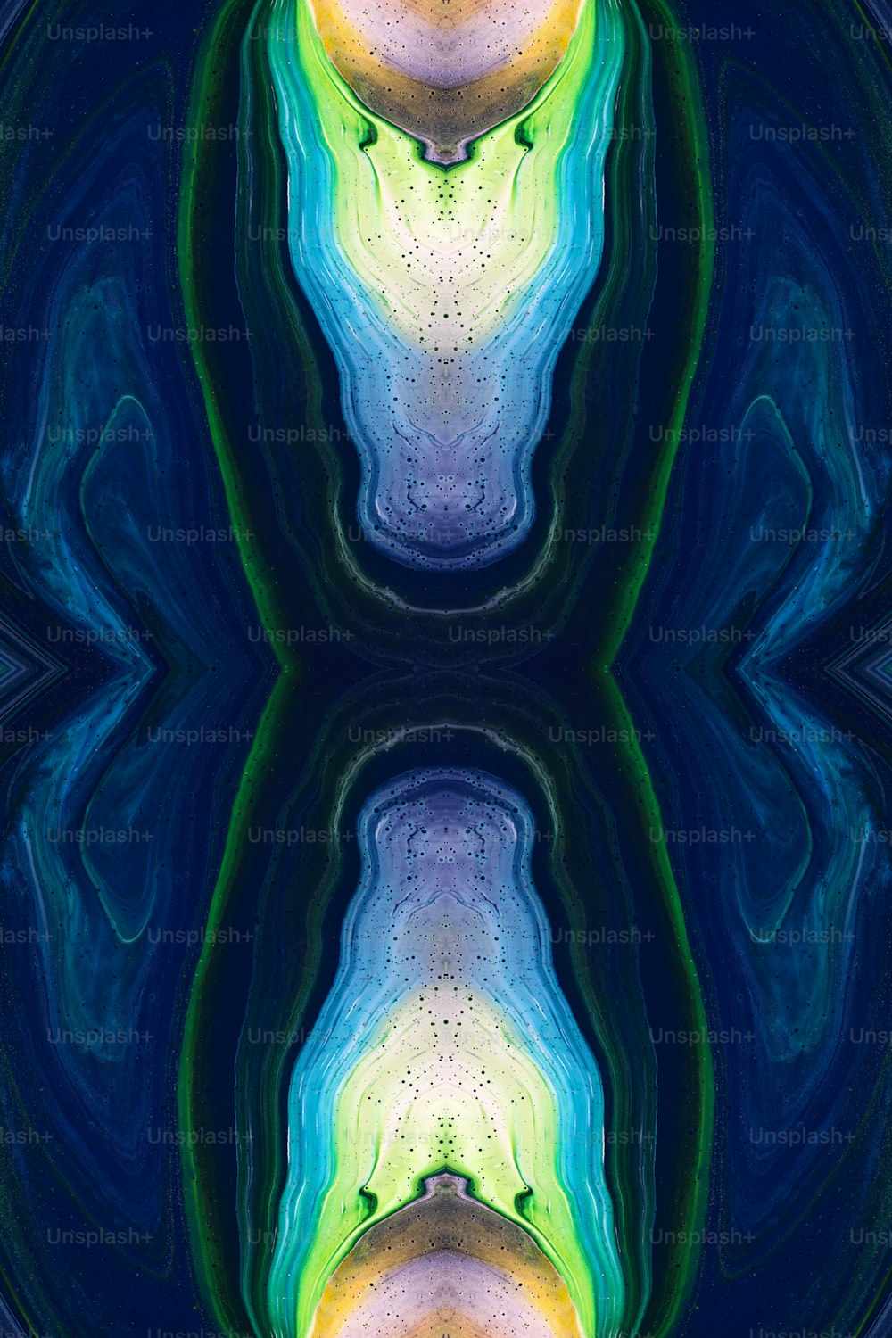 an abstract image of a blue, yellow, and green pattern