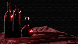 Tres botellas de vino están sentadas sobre una mesa