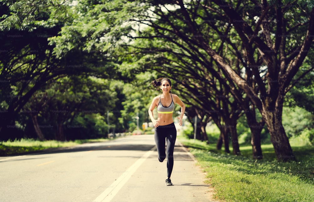 Asian women Jogging in the morning at the park