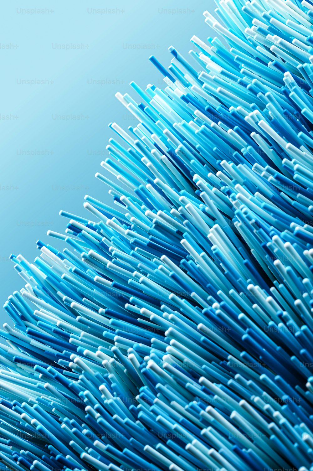 a close up of a bunch of blue toothbrushes