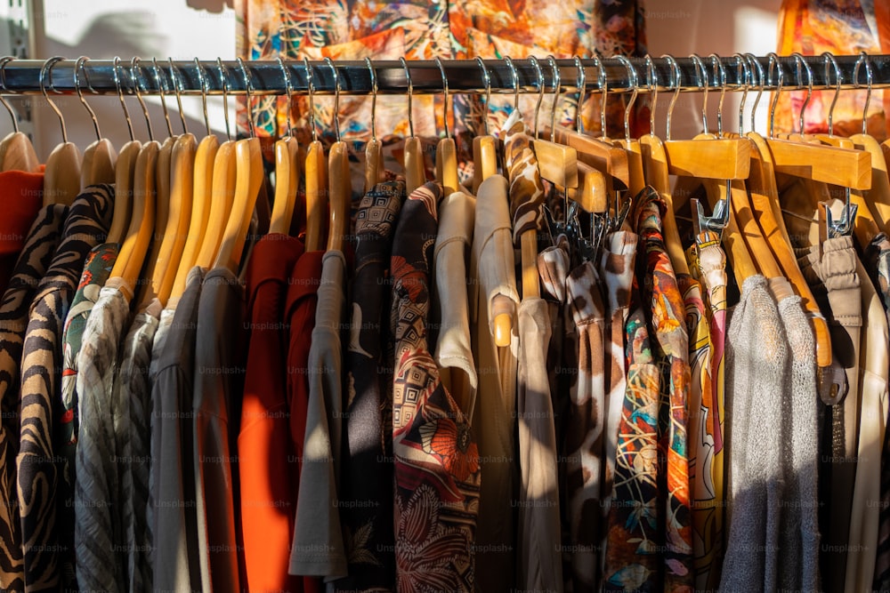 a rack of shirts and ties in a store