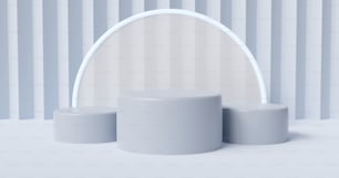 a white round mirror sitting on top of a table