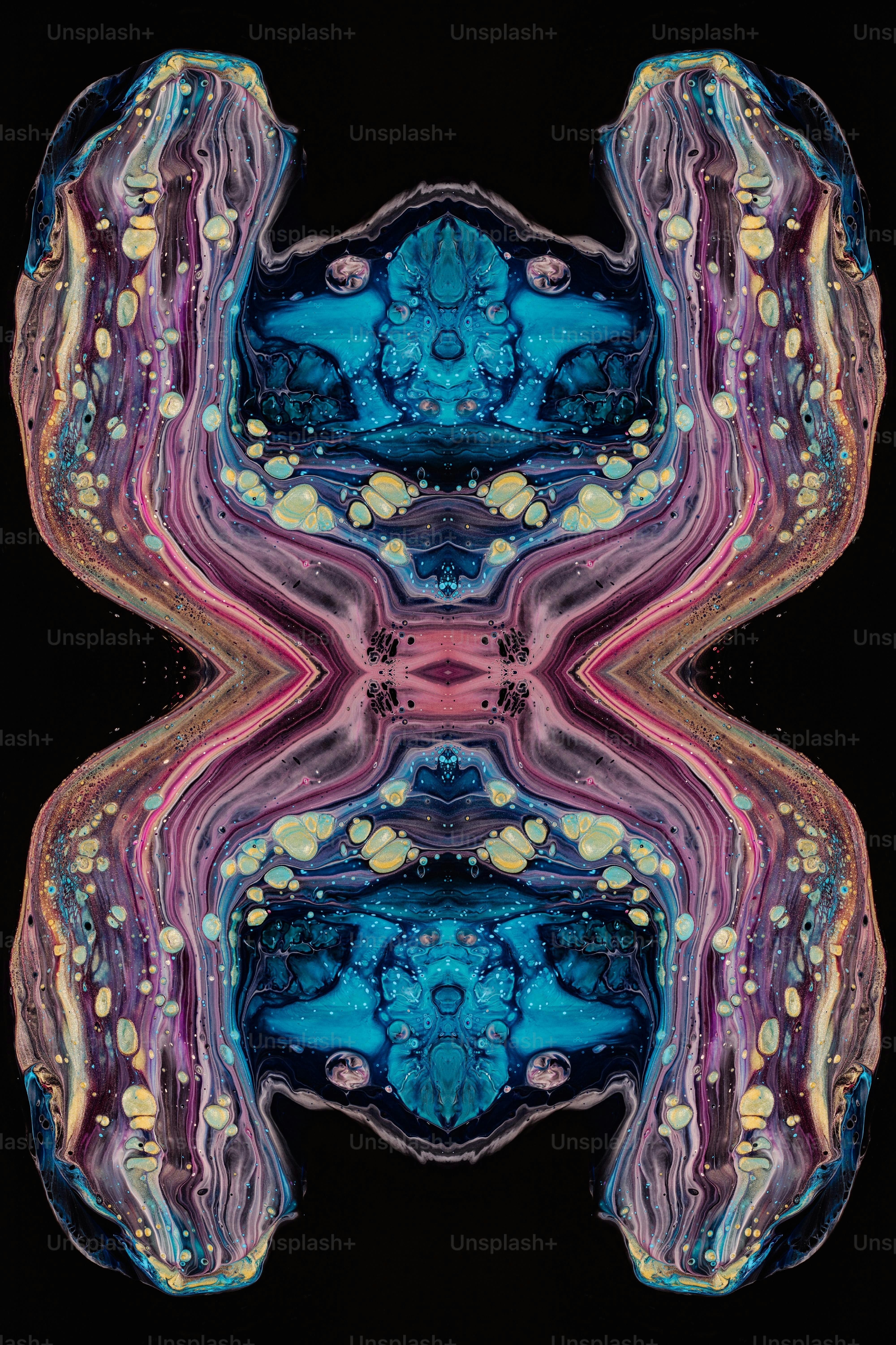an abstract image of blue and pink shapes