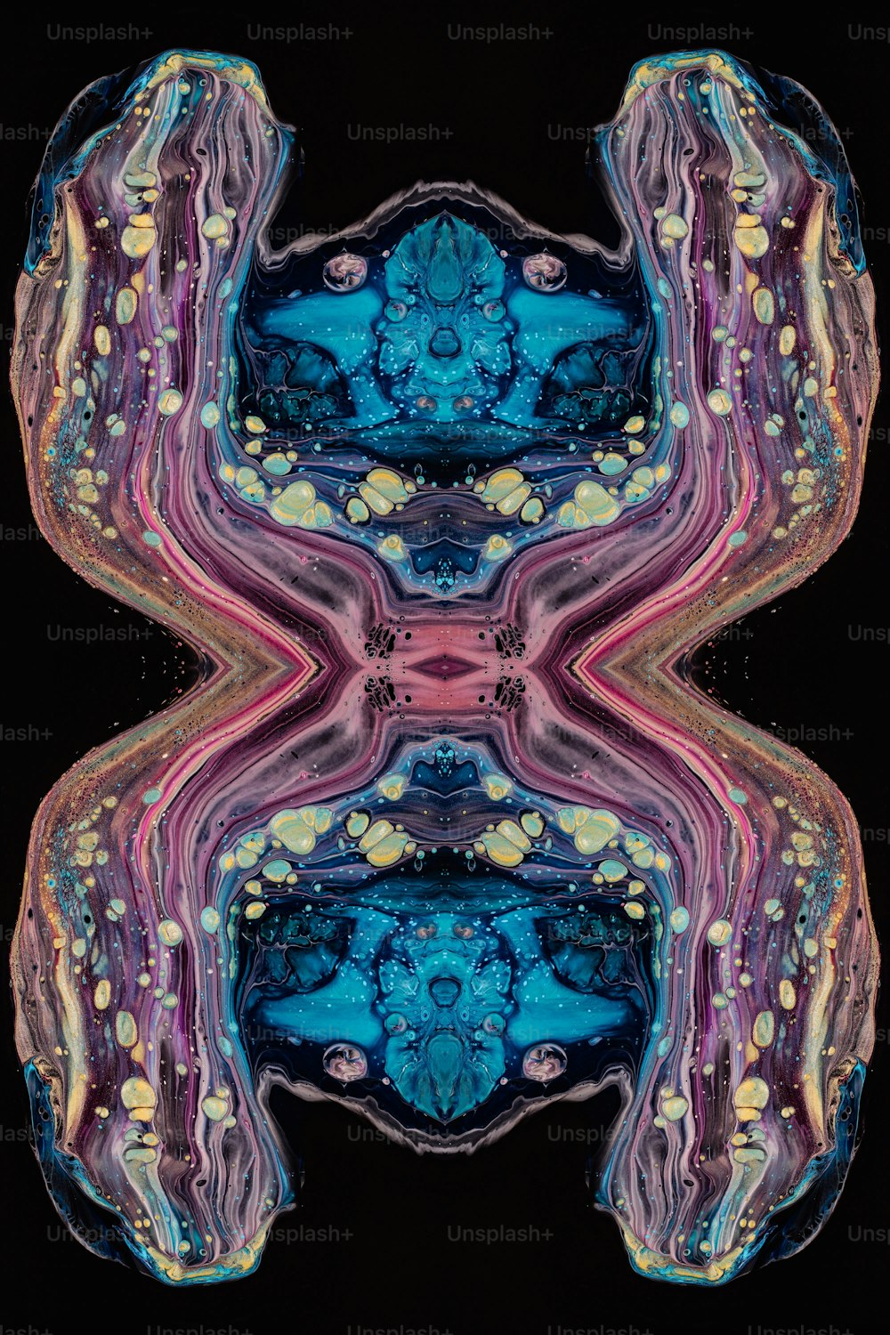 an abstract image of blue and pink shapes