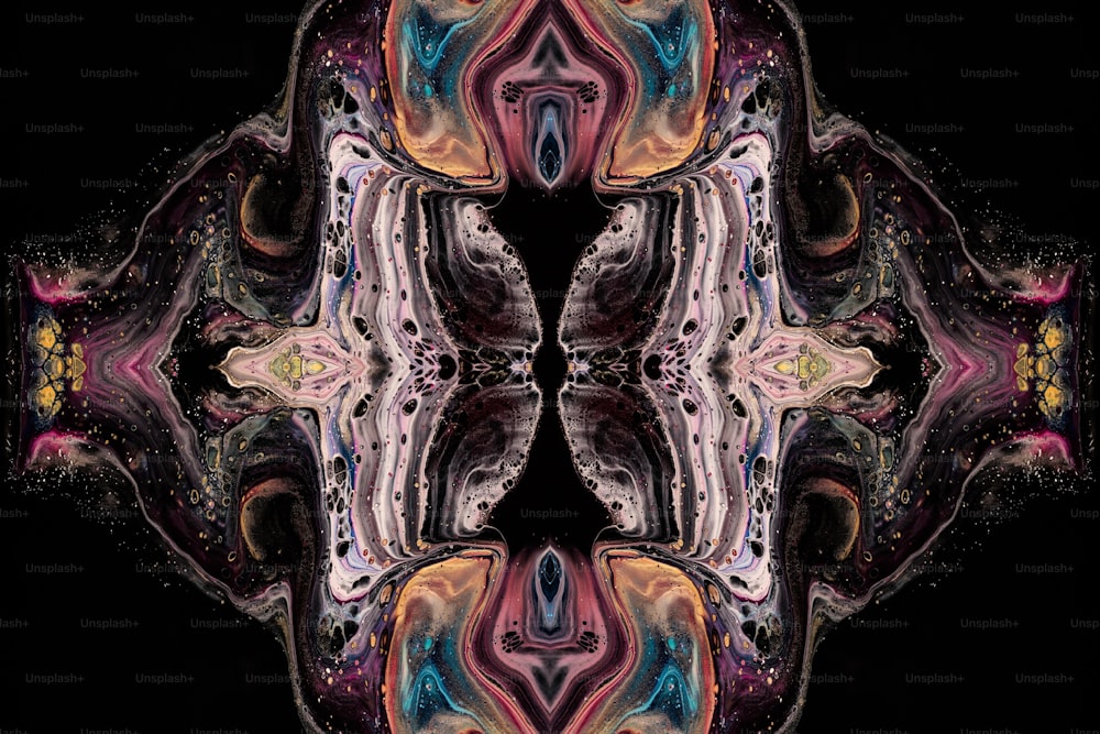une image abstraite d’un fond noir avec un motif multicolore