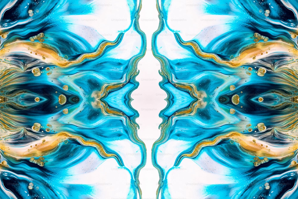 an abstract image of a blue and yellow flower
