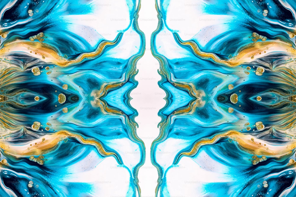 an abstract image of a blue and yellow flower