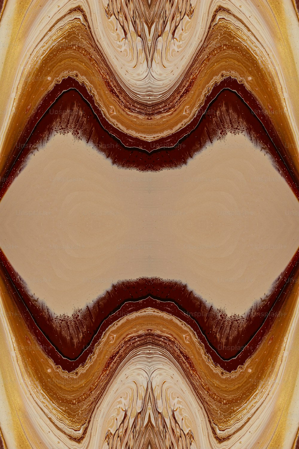 an abstract image of a brown and beige background
