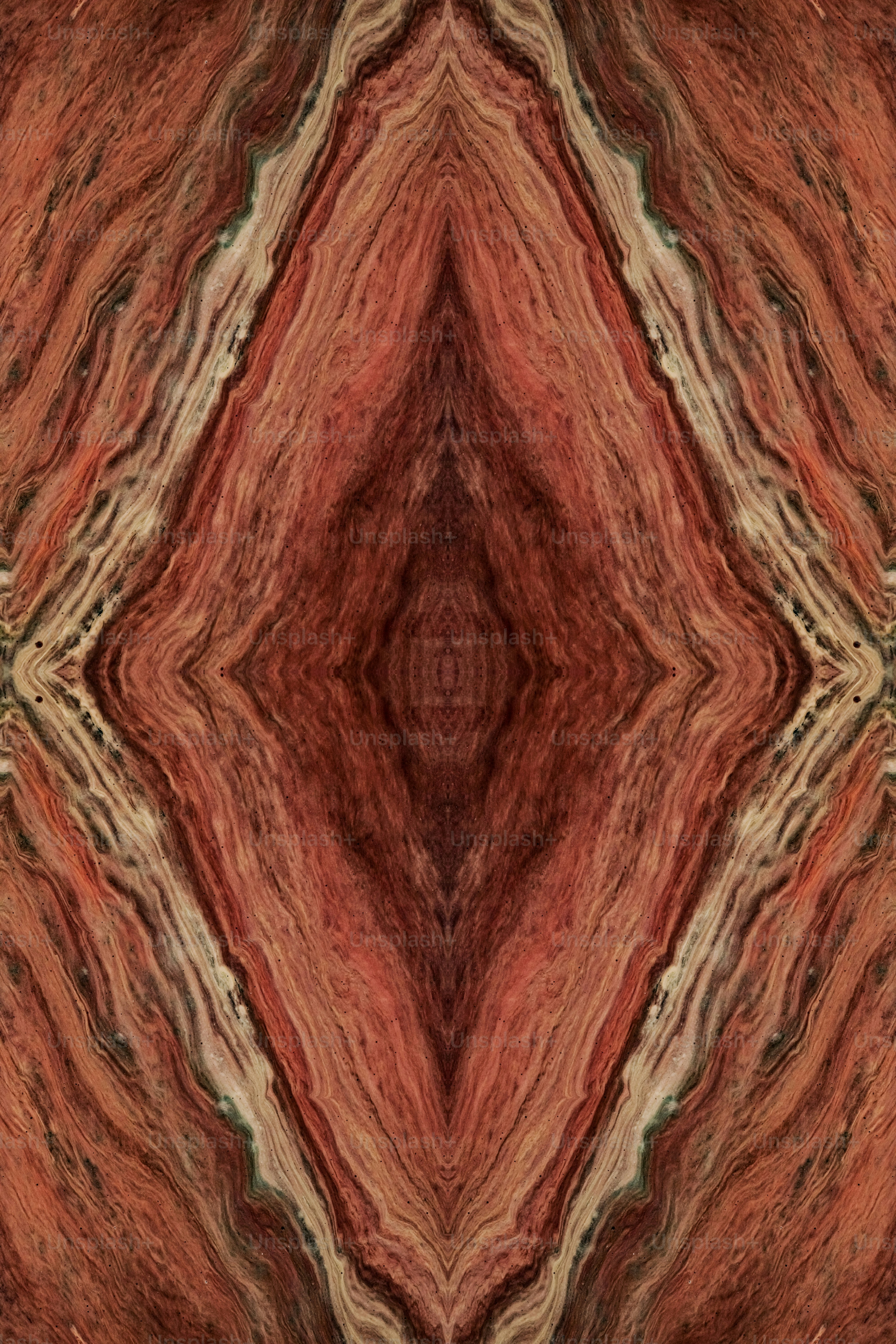 Un'immagine astratta di un motivo rosso e marrone