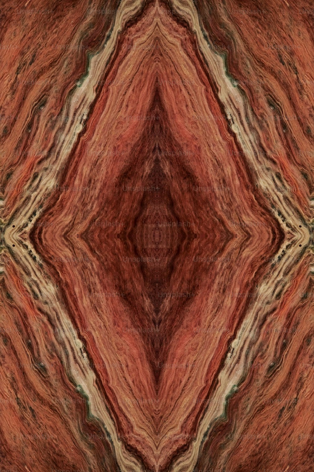 an abstract image of a red and brown pattern