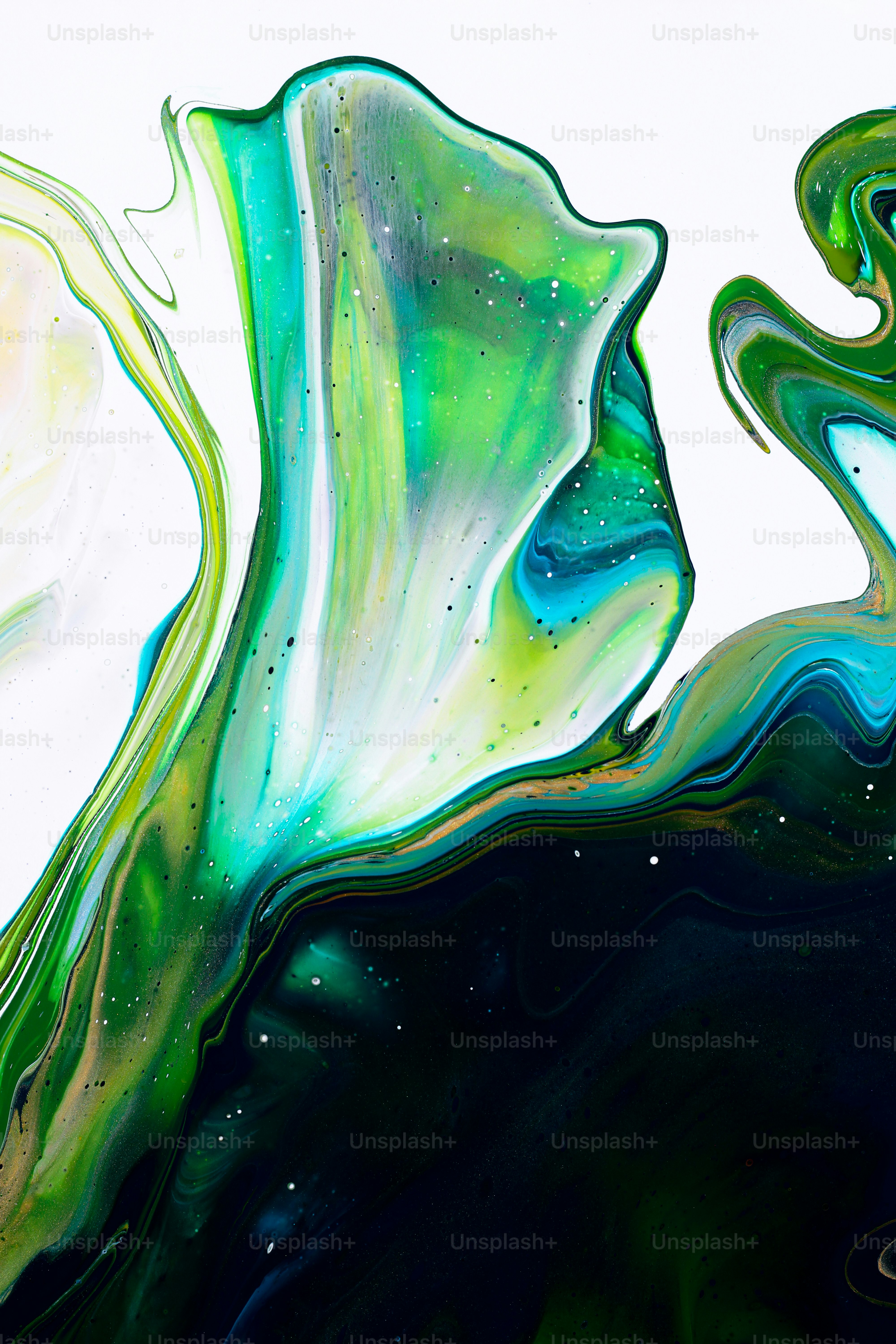 a close up of a liquid painting on a white background