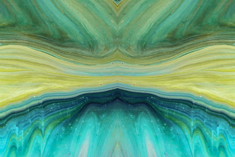 an abstract painting with blue, yellow and green colors
