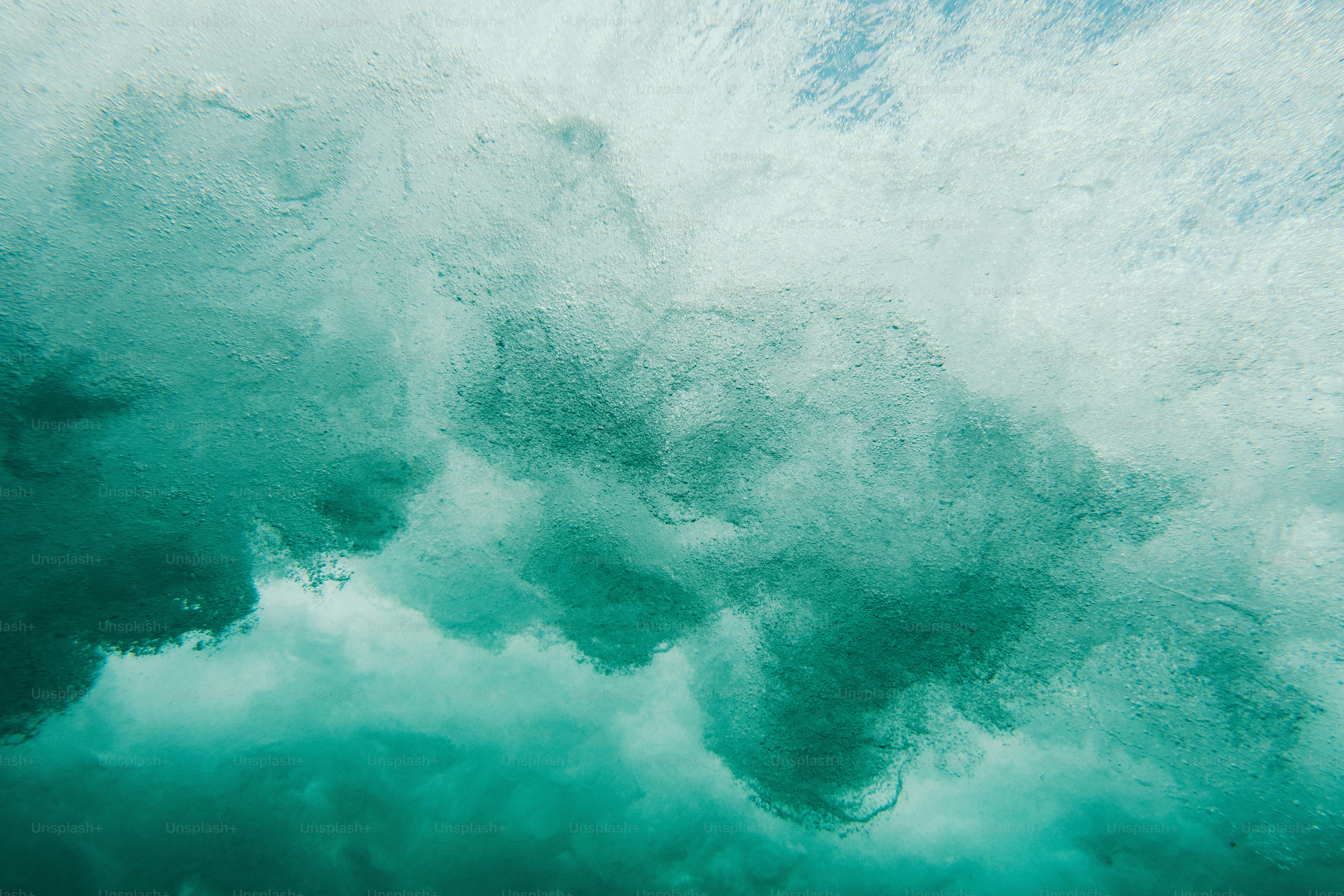 a large body of water with a sky background