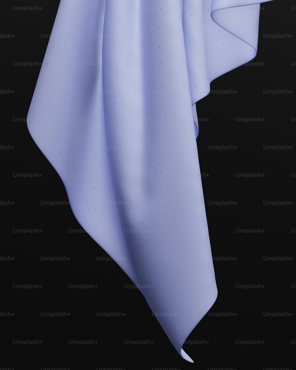 Ein weißer Schal hängt auf schwarzem Hintergrund