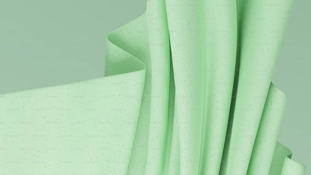 Un primer plano de una lámina de material verde