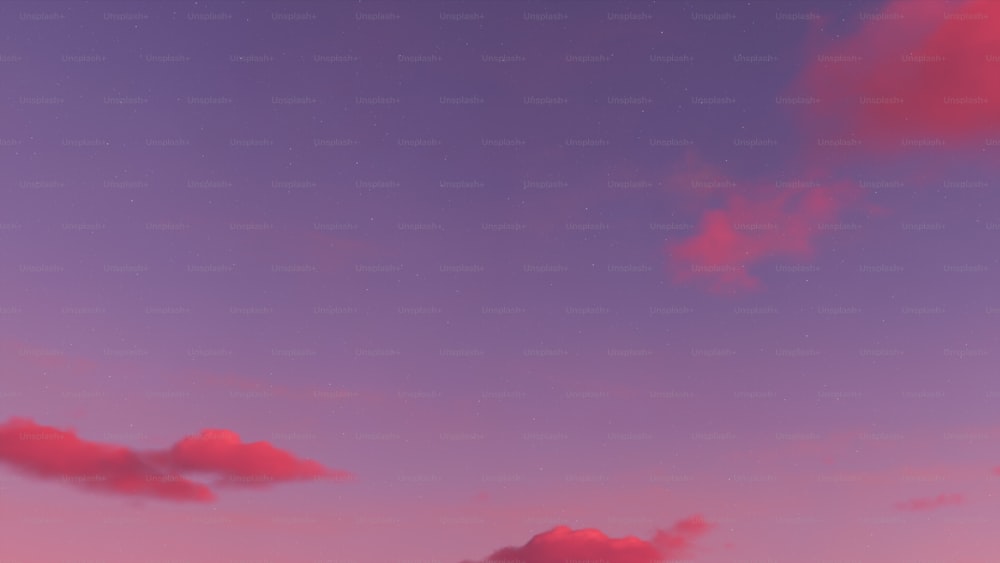 Un ciel rose et violet avec quelques nuages