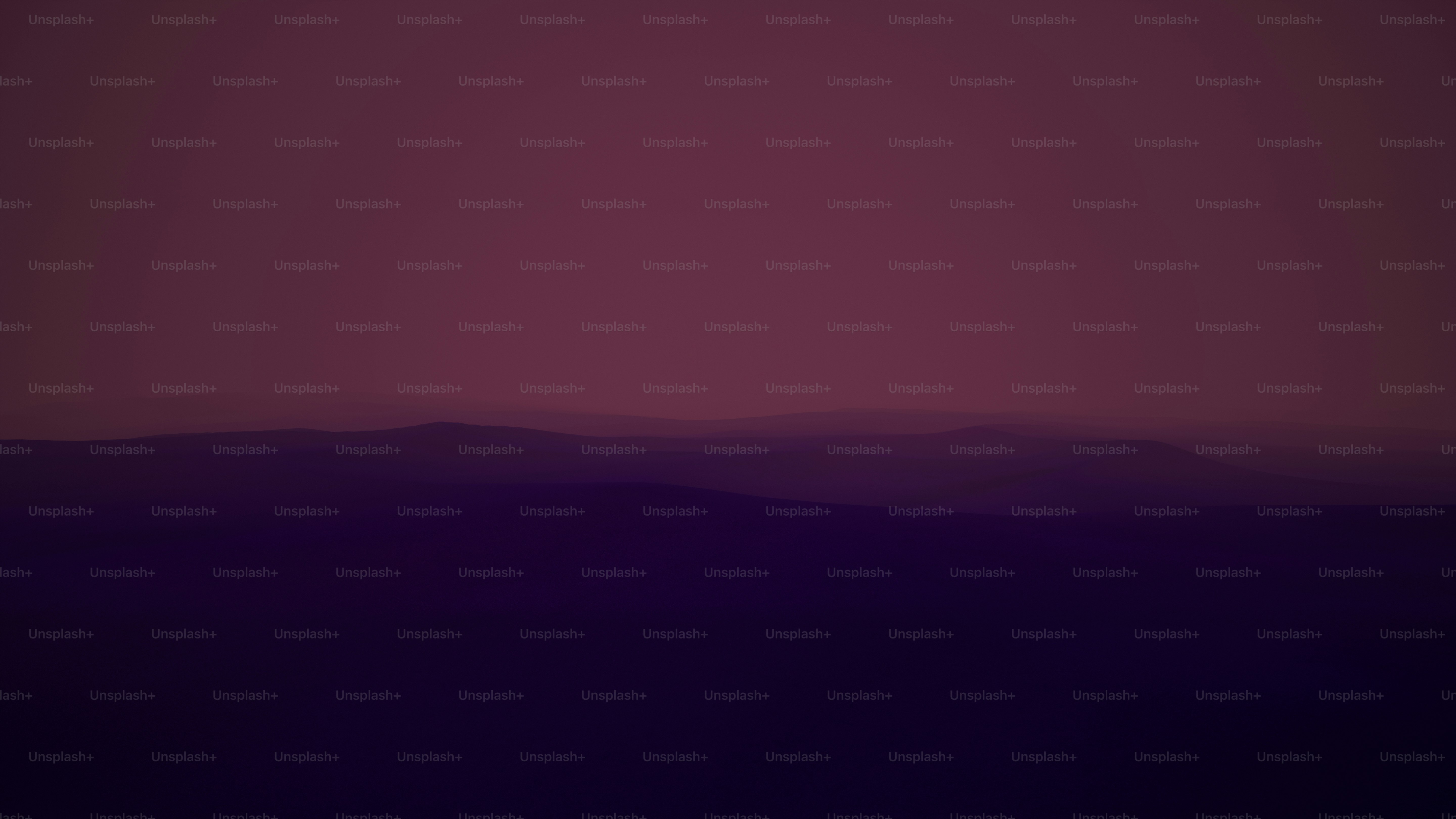 a view of a mountain range from a distance