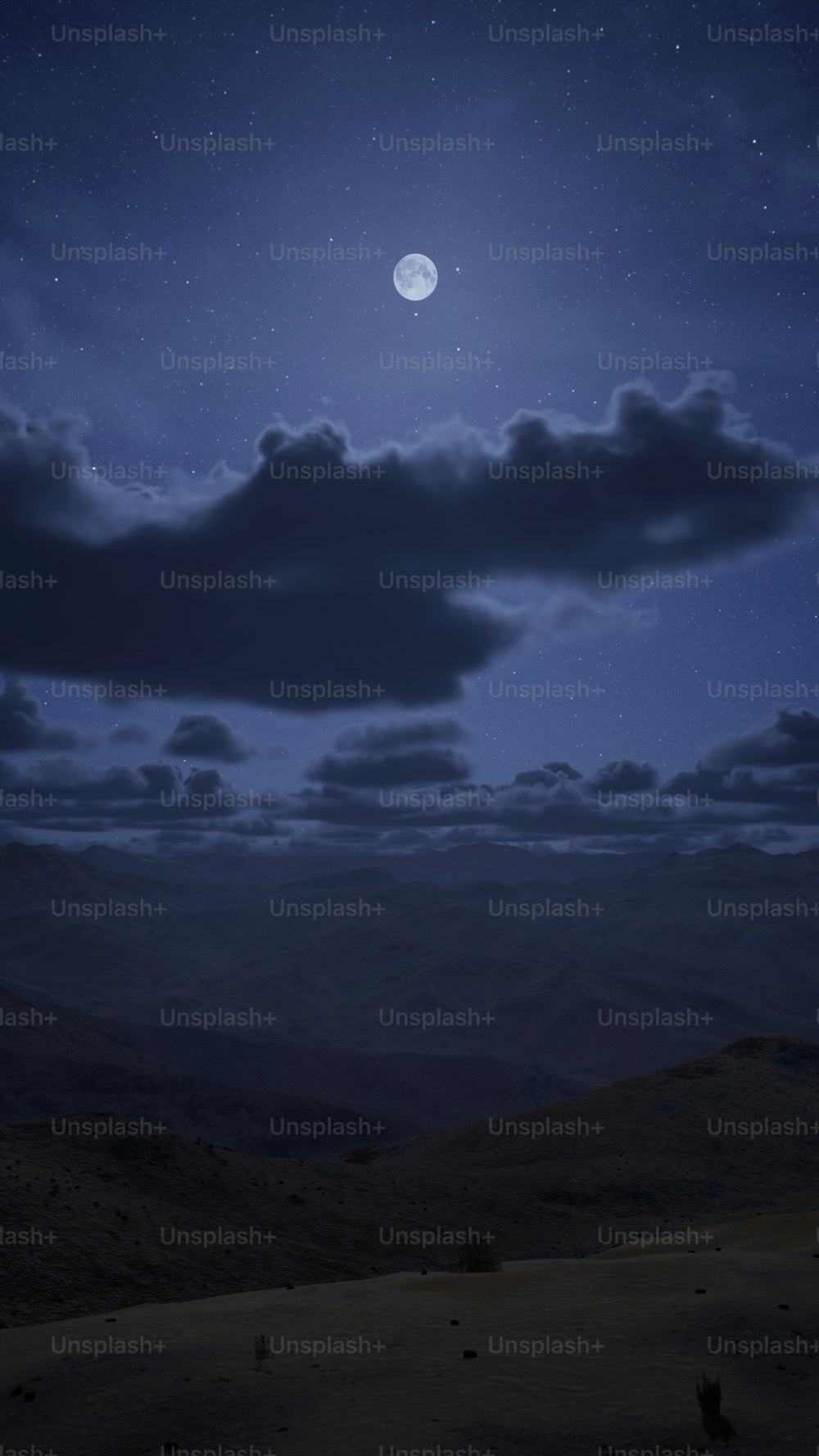 the night sky with a full moon and clouds