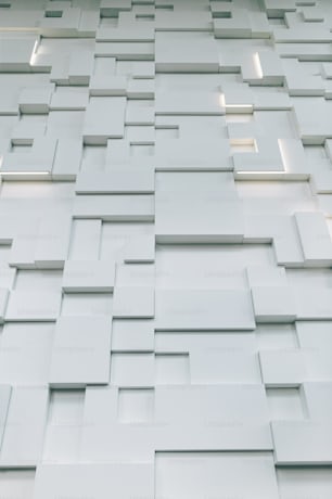 a white wall that has a bunch of squares on it