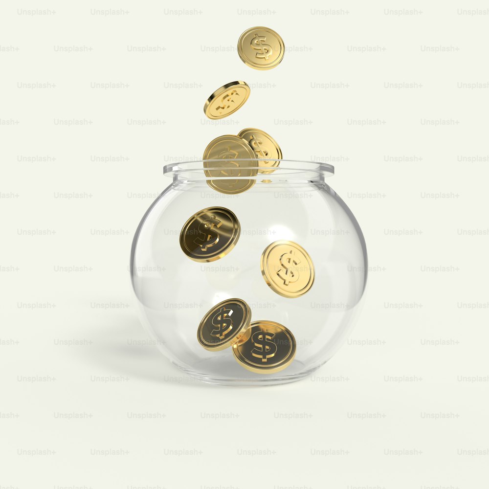 a glass bowl filled with coins on top of a white surface