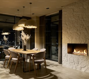 a dining room with a table and chairs and a fire place