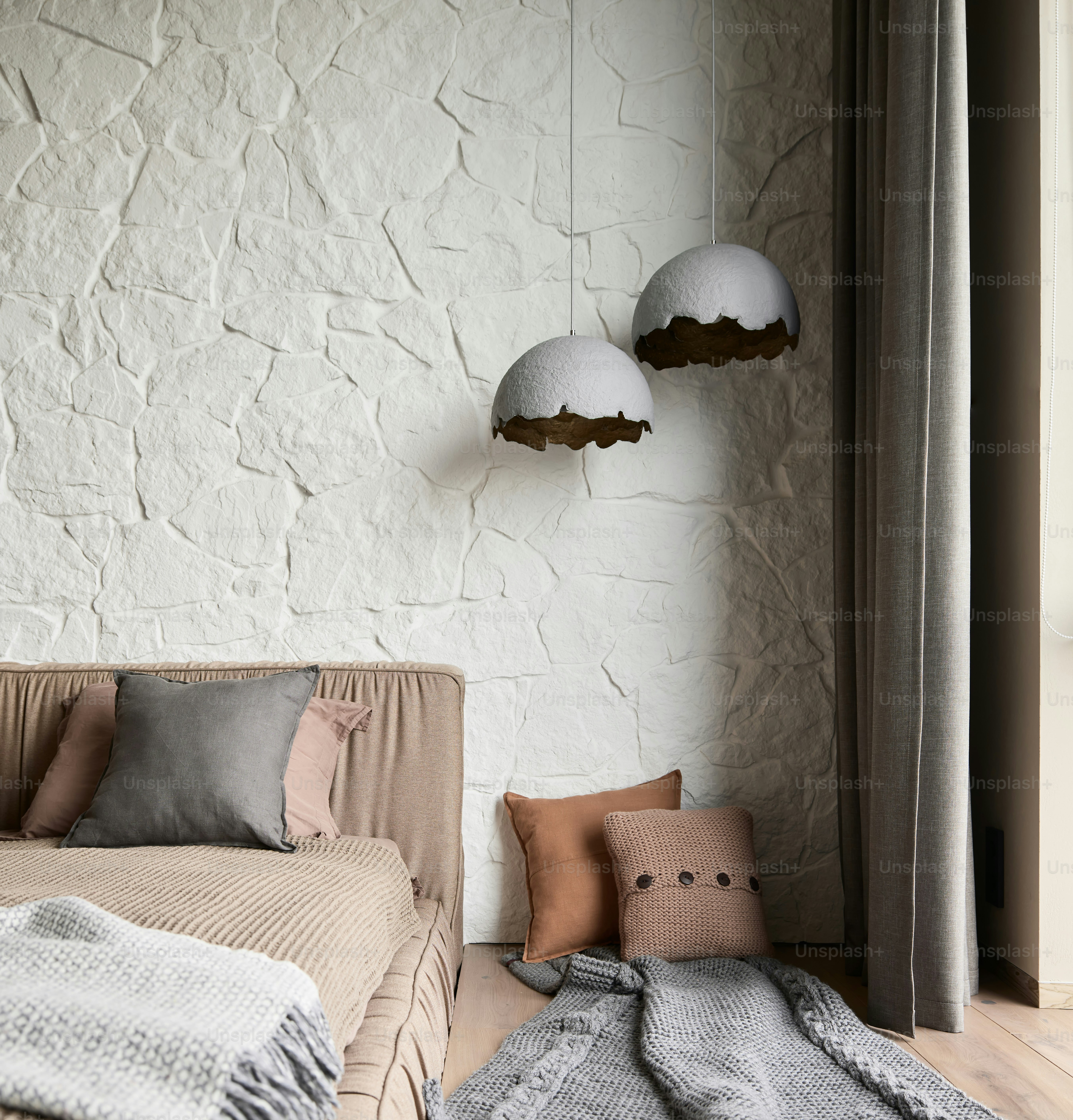 a living room with a couch and pillows