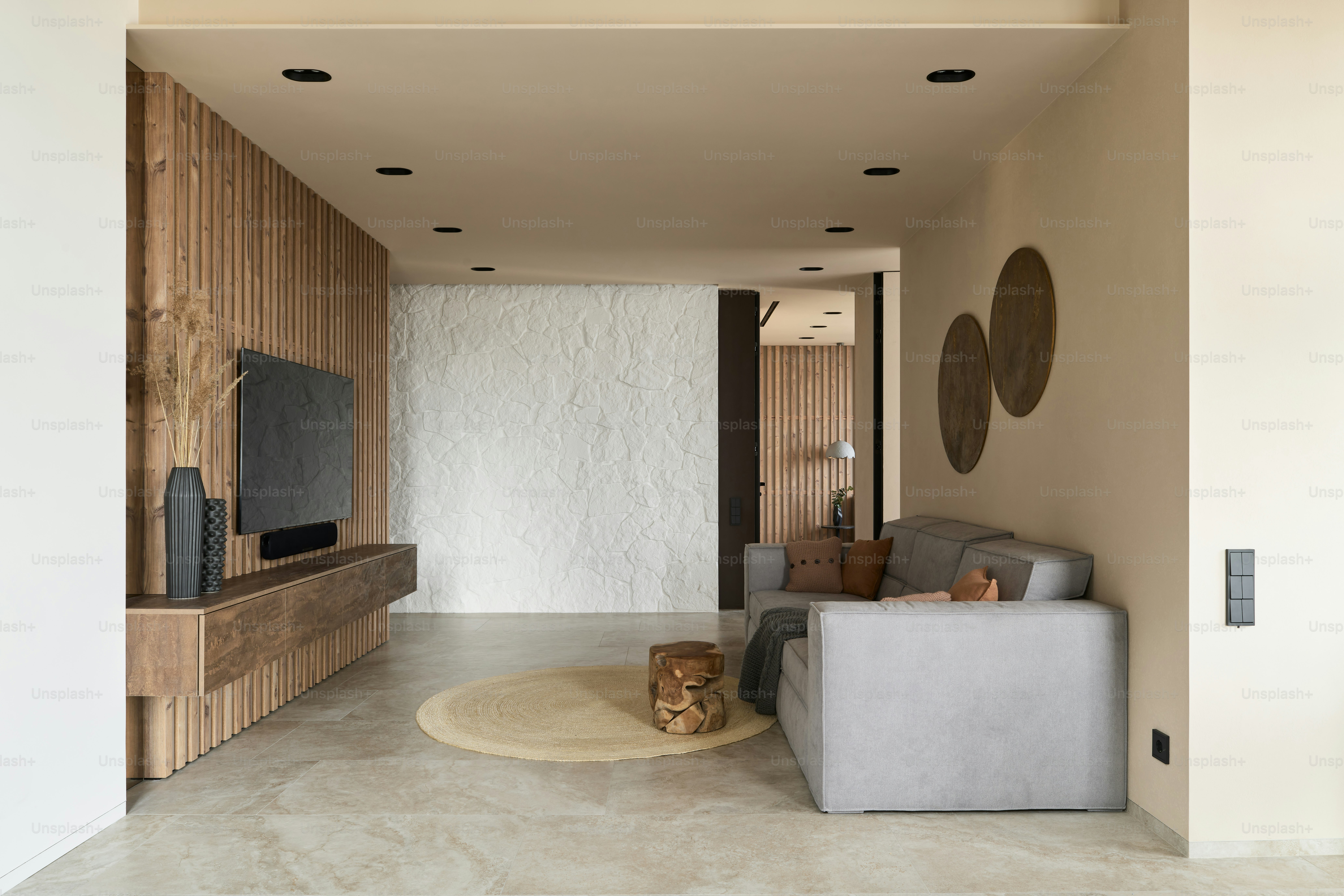 a living room with a couch and a television