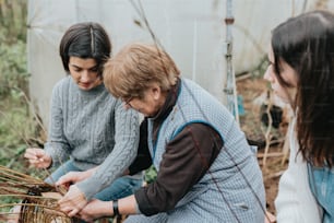 a group of women working in a garden