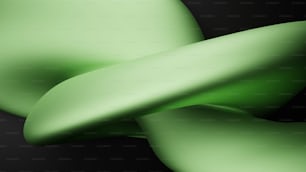 a close up of a green object on a black background