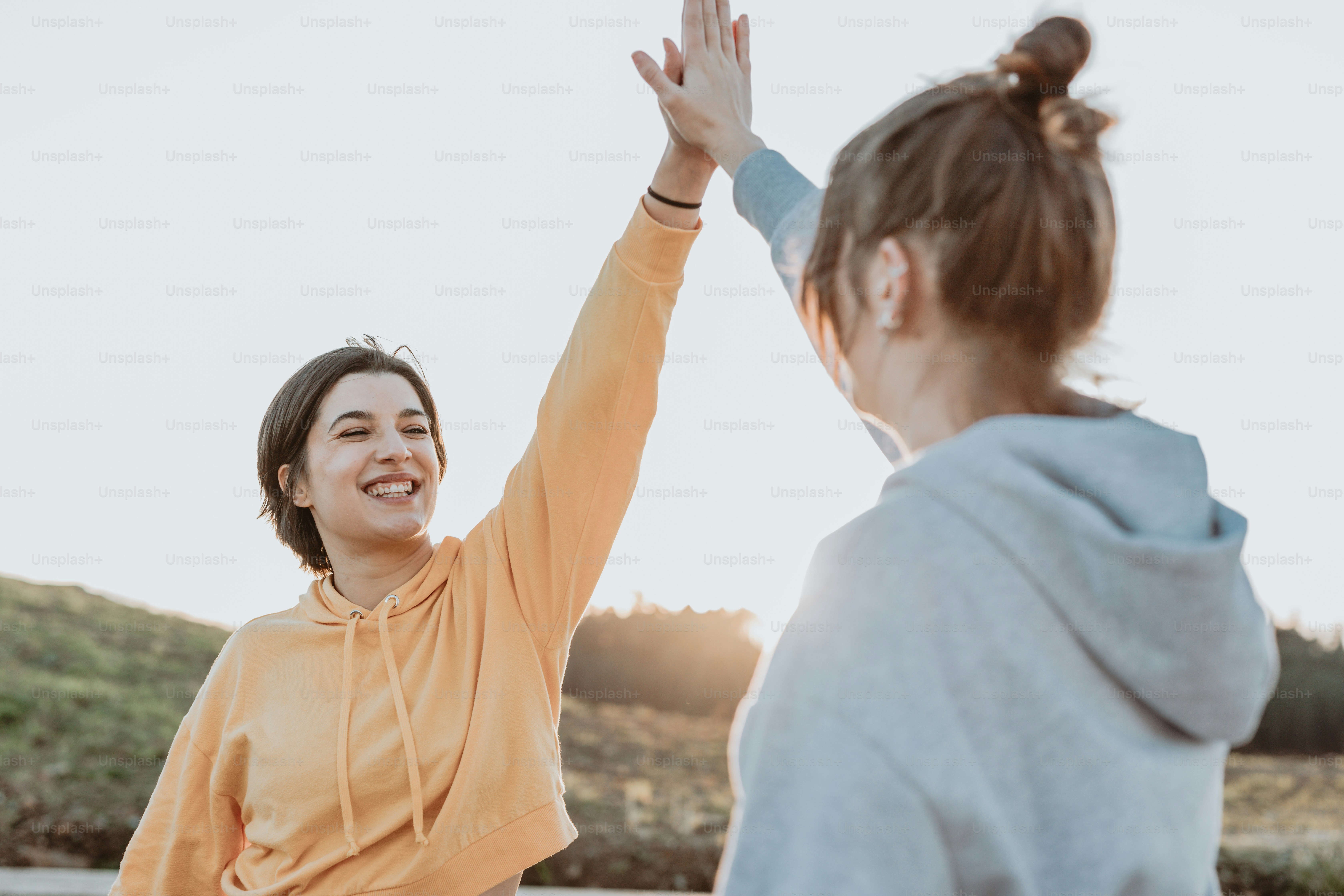 a couple of women standing next to each other