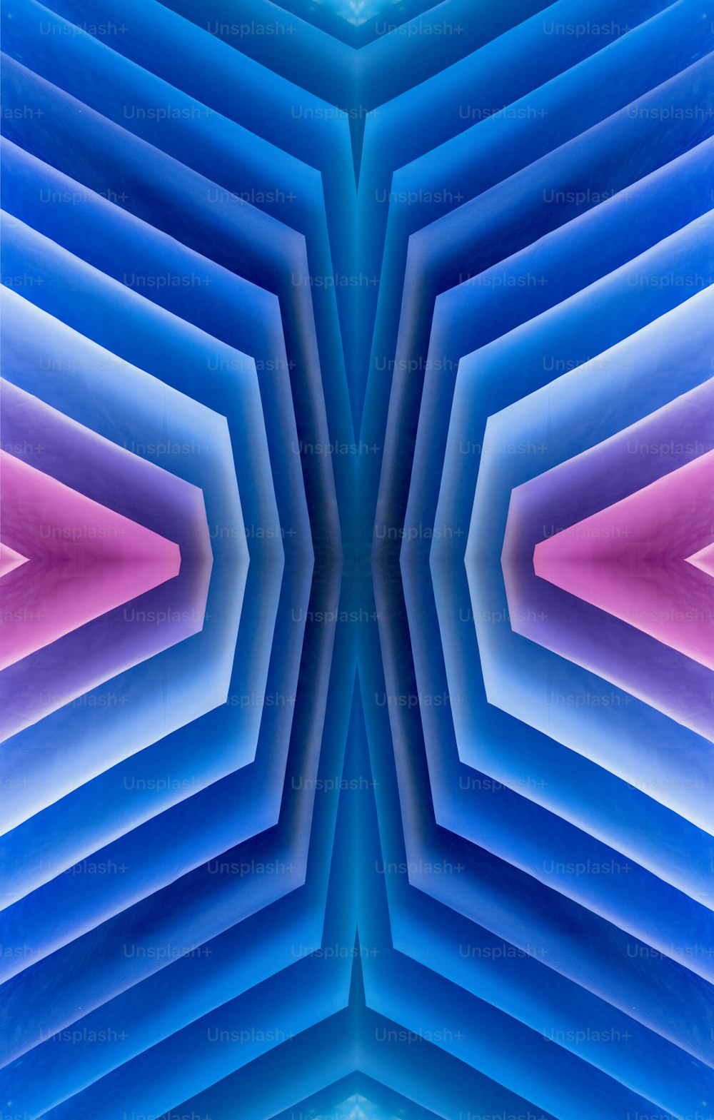 Une image abstraite d’une structure bleue et rose