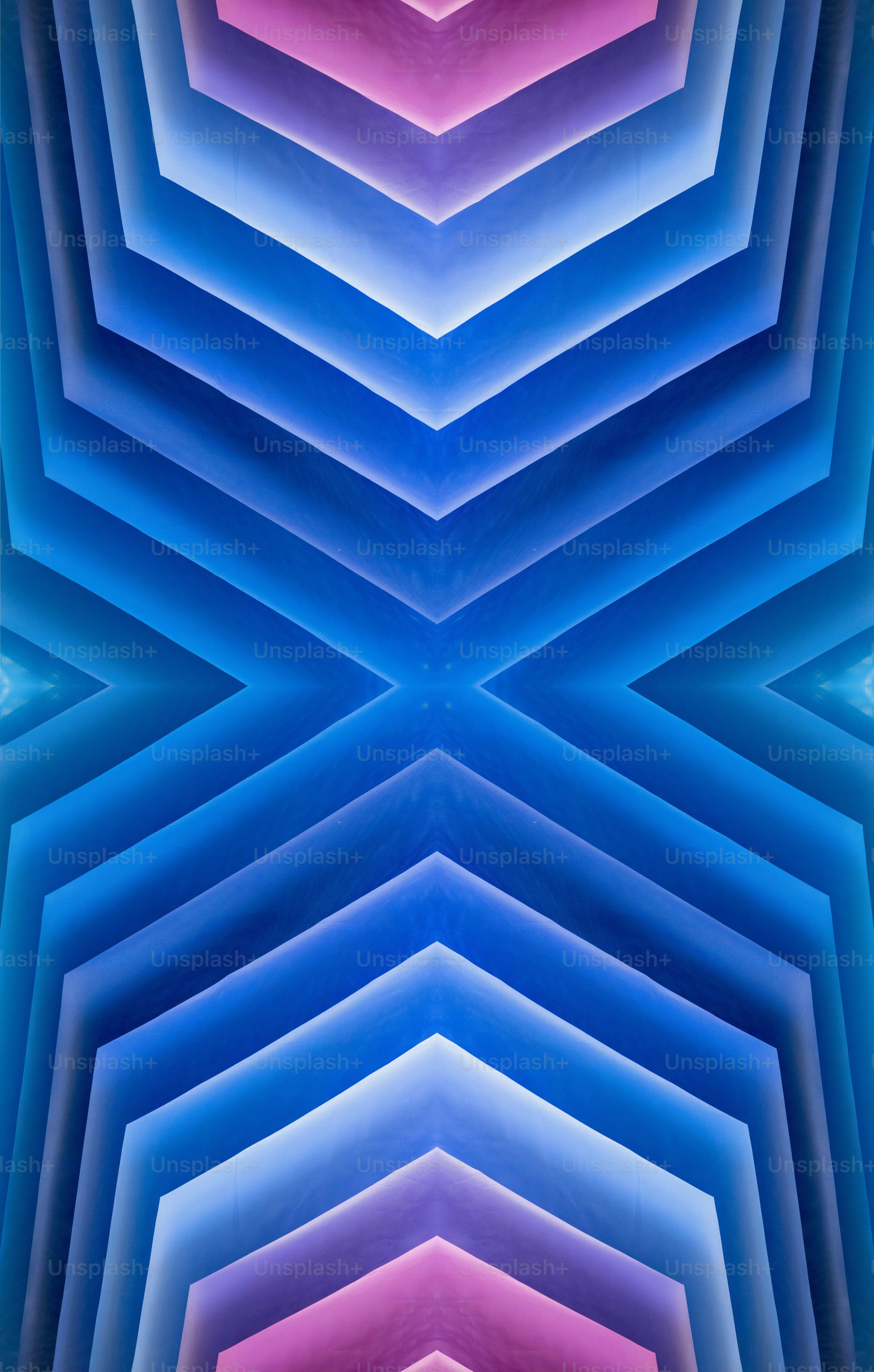 an abstract image of blue, pink, and purple shapes