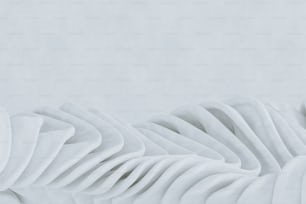 Un primer plano de una escultura blanca sobre un fondo blanco