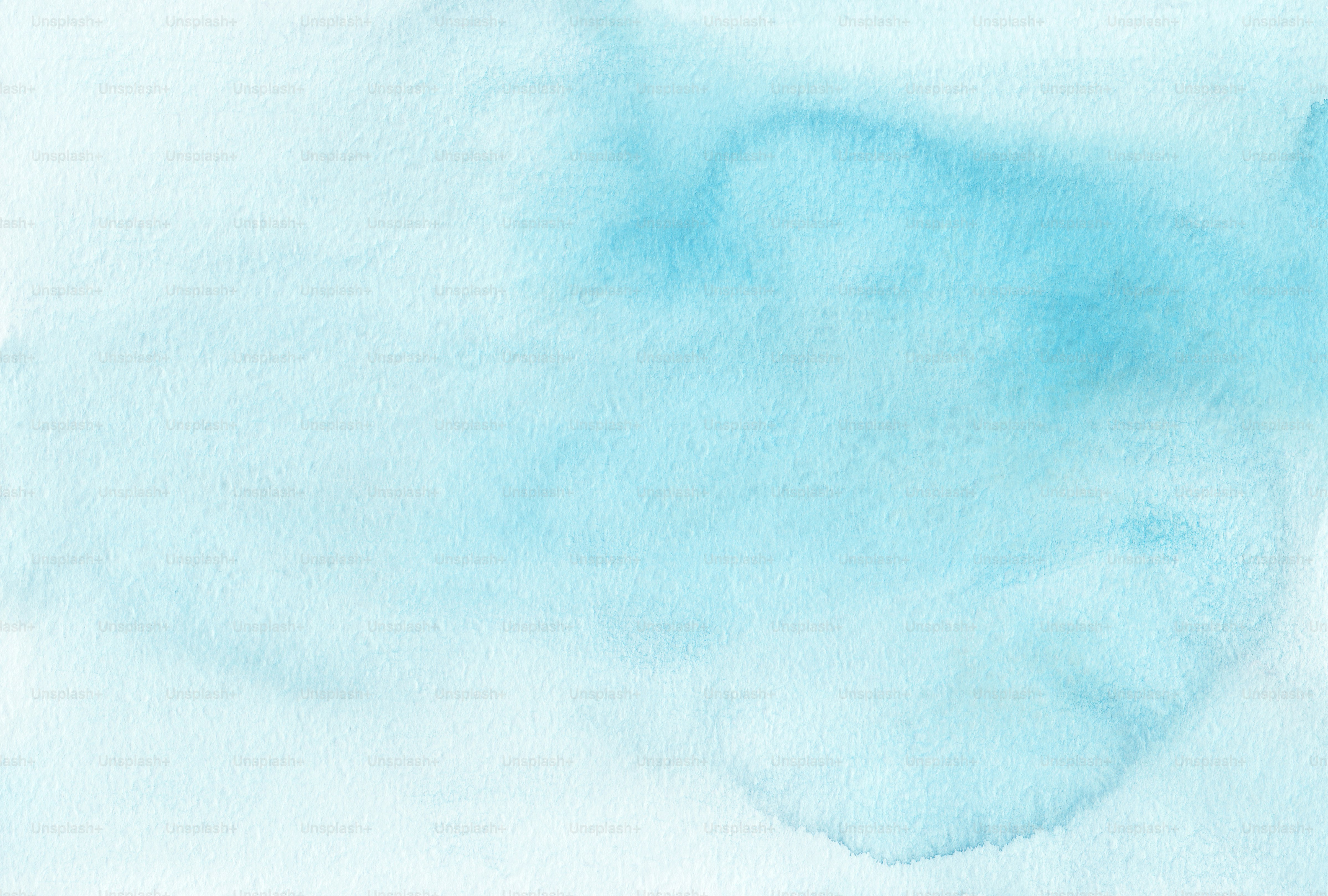 un fondo de acuarela azul con un fondo blanco