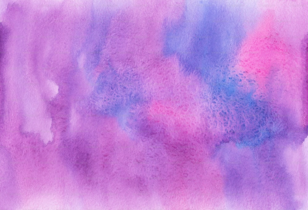 a watercolor painting of purple and blue colors