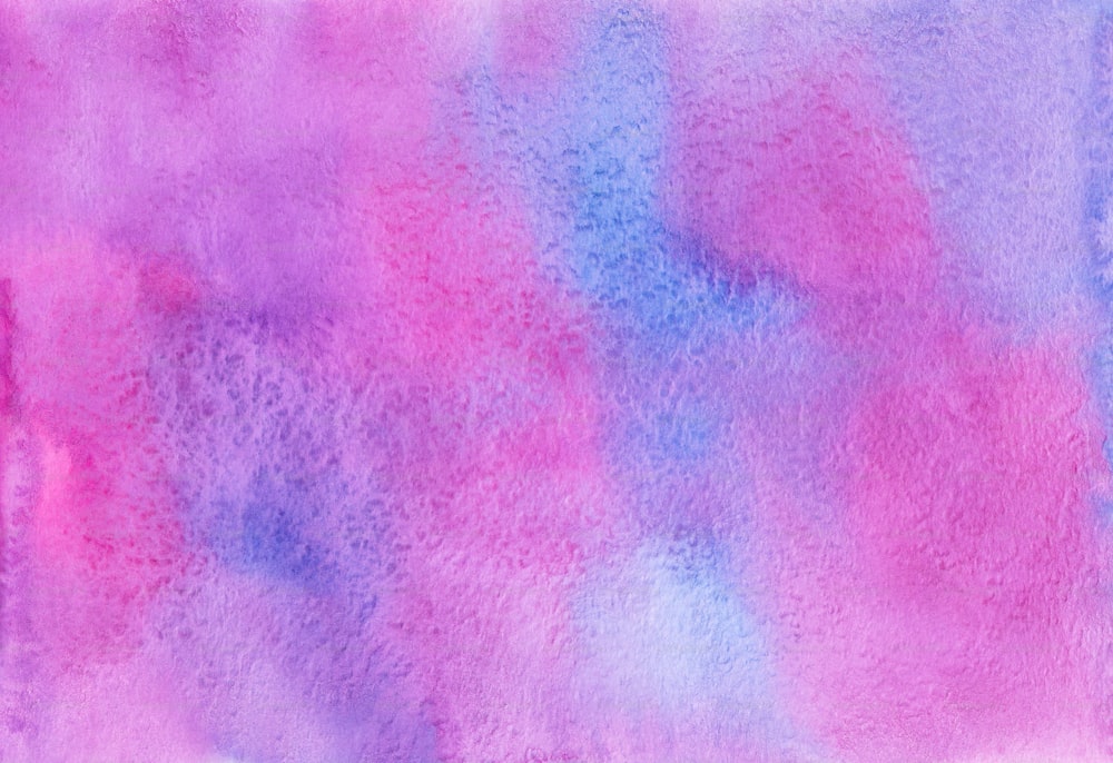 a painting of pink and blue colors on a white background