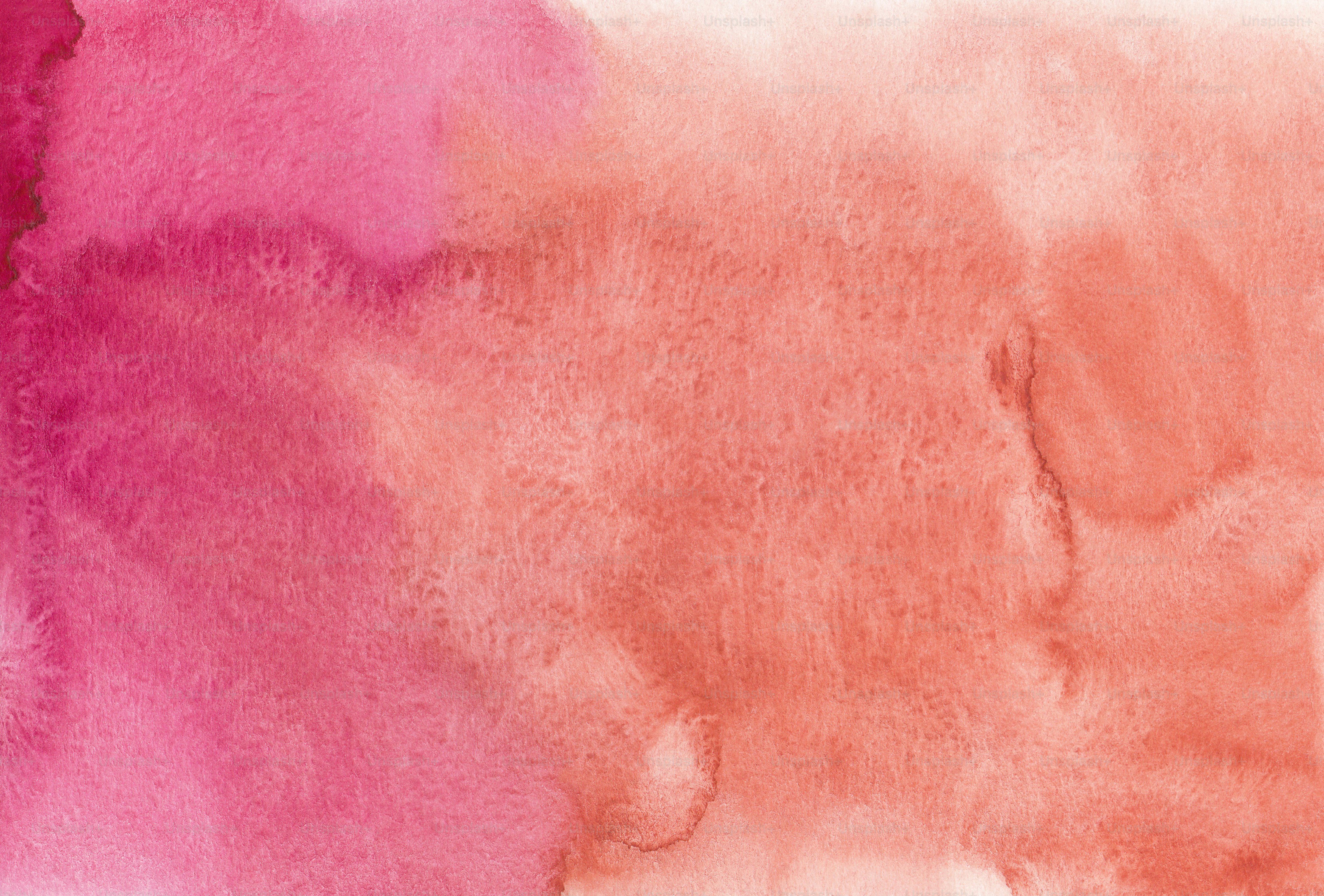 Una acuarela de rosa y naranja