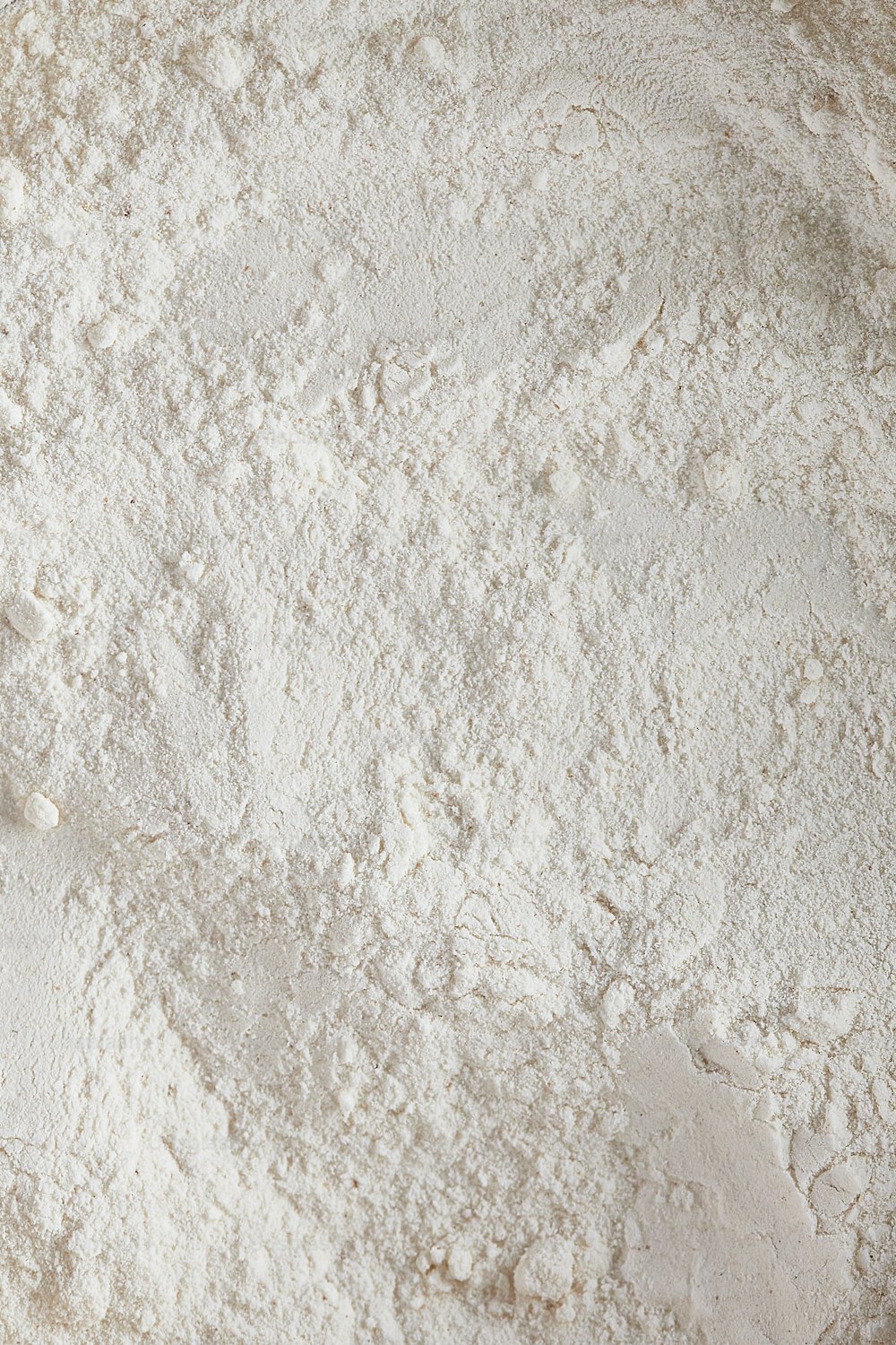 a close up of a bowl of flour