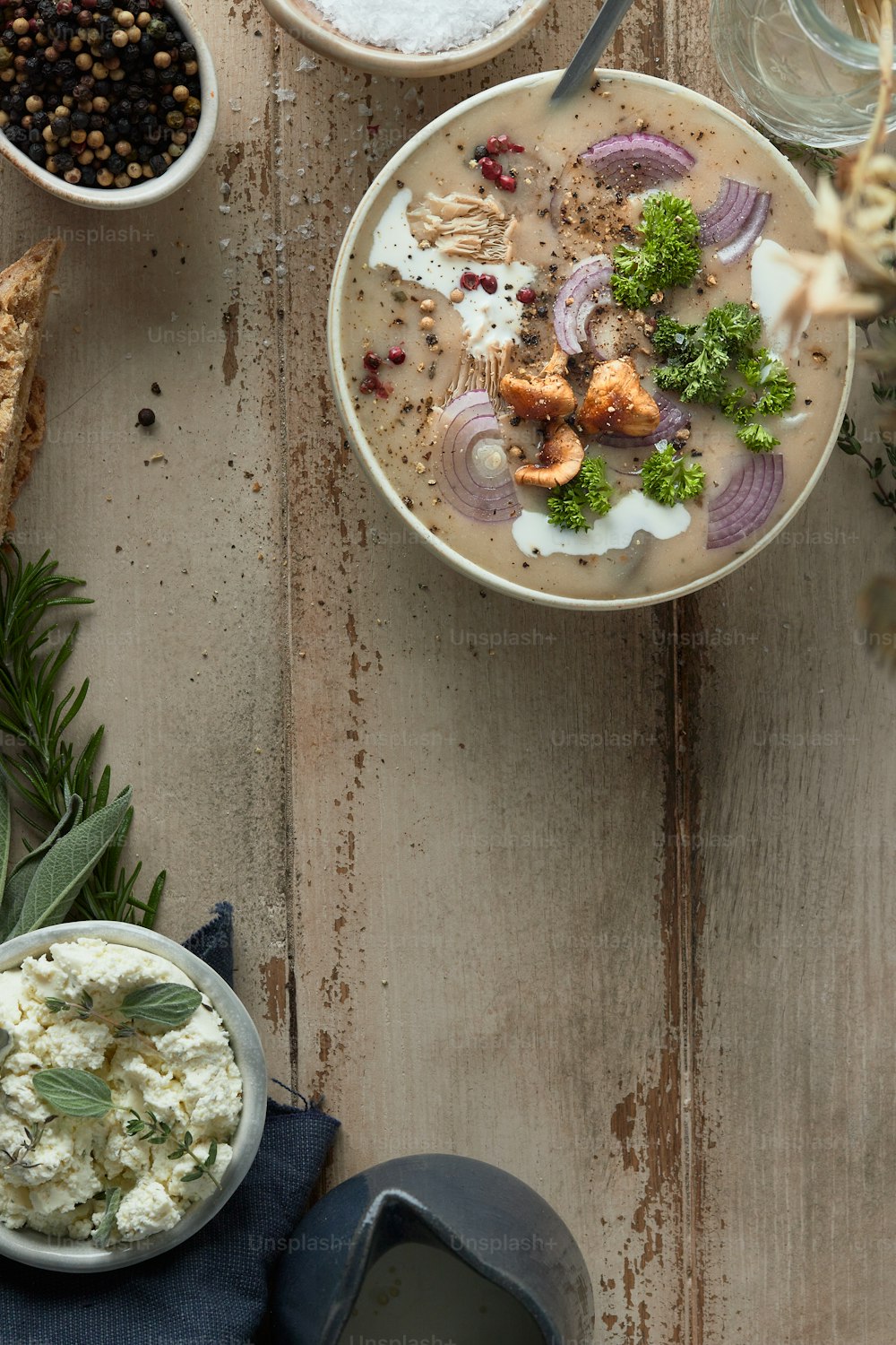 a table topped with bowls filled with food