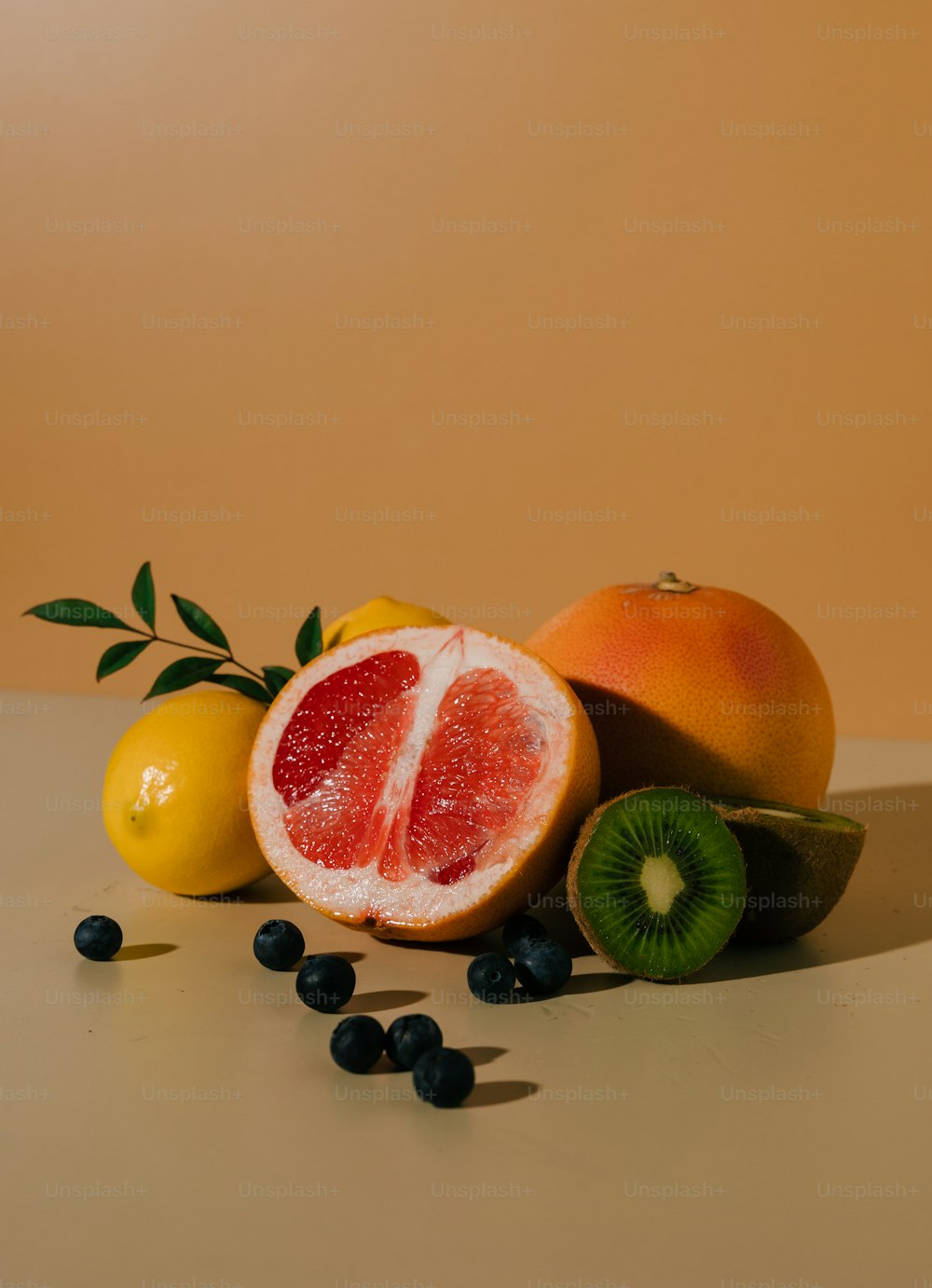 a group of fruit sitting on top of a table