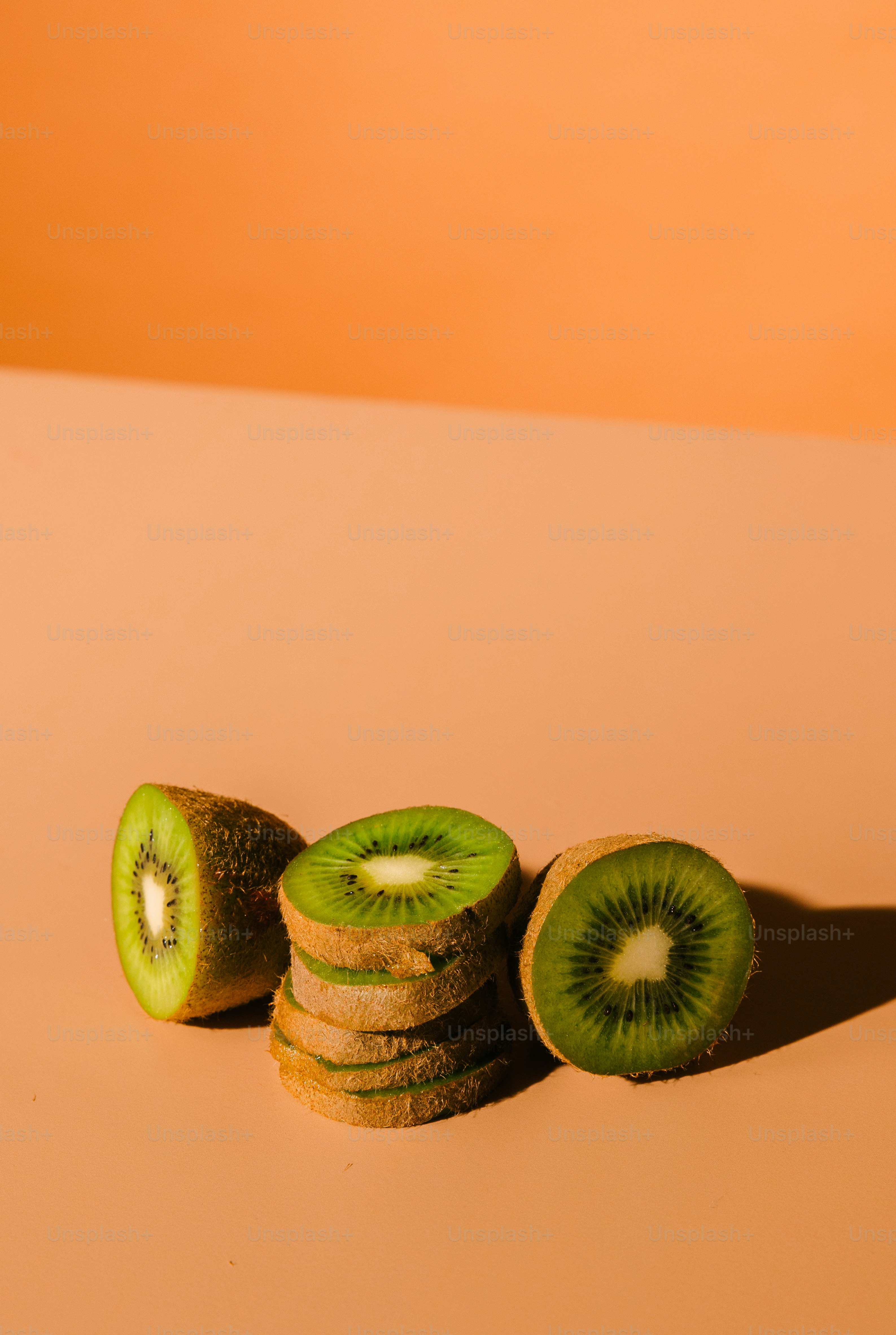 a couple of kiwi slices sitting on top of each other