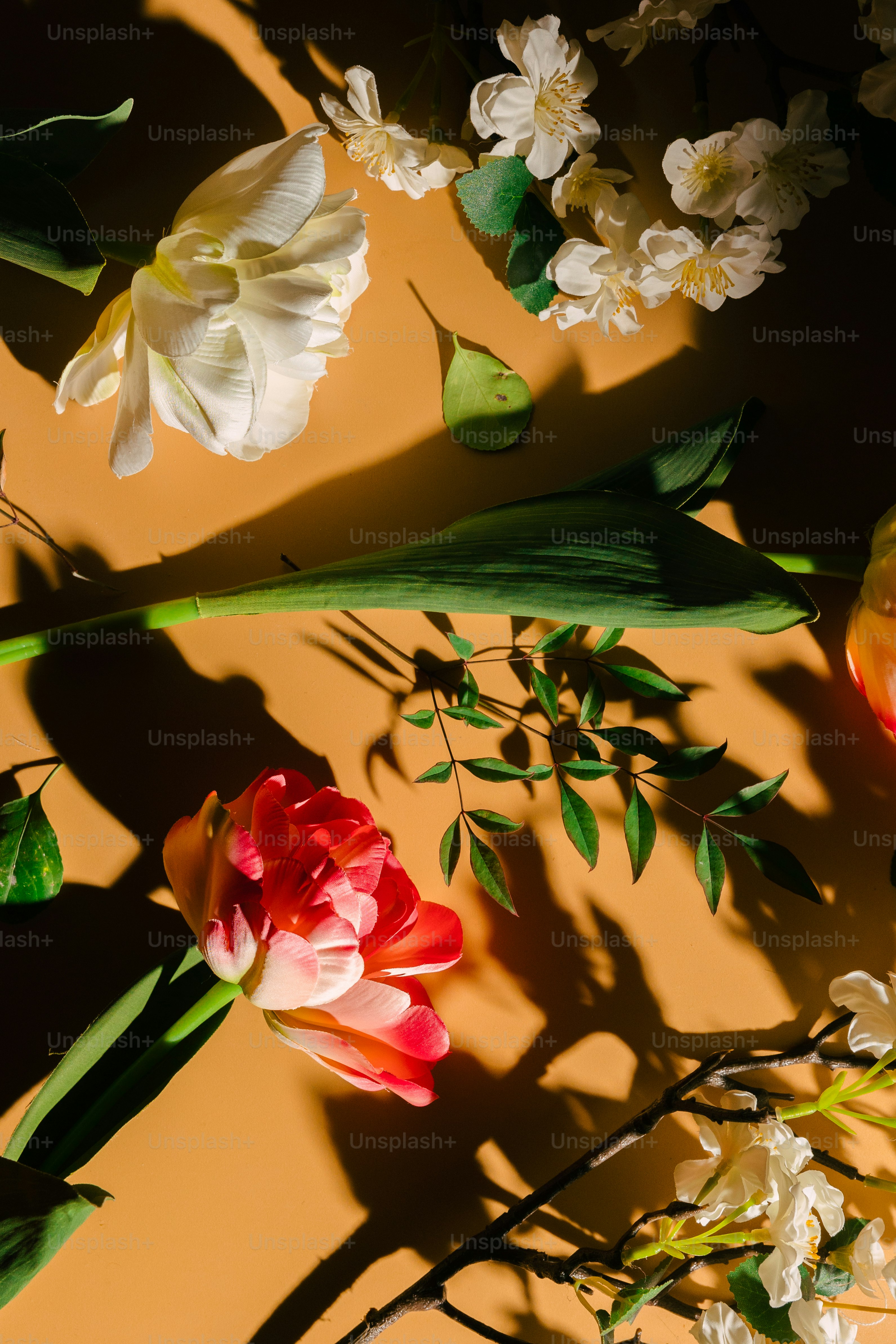 a group of flowers sitting on top of a table