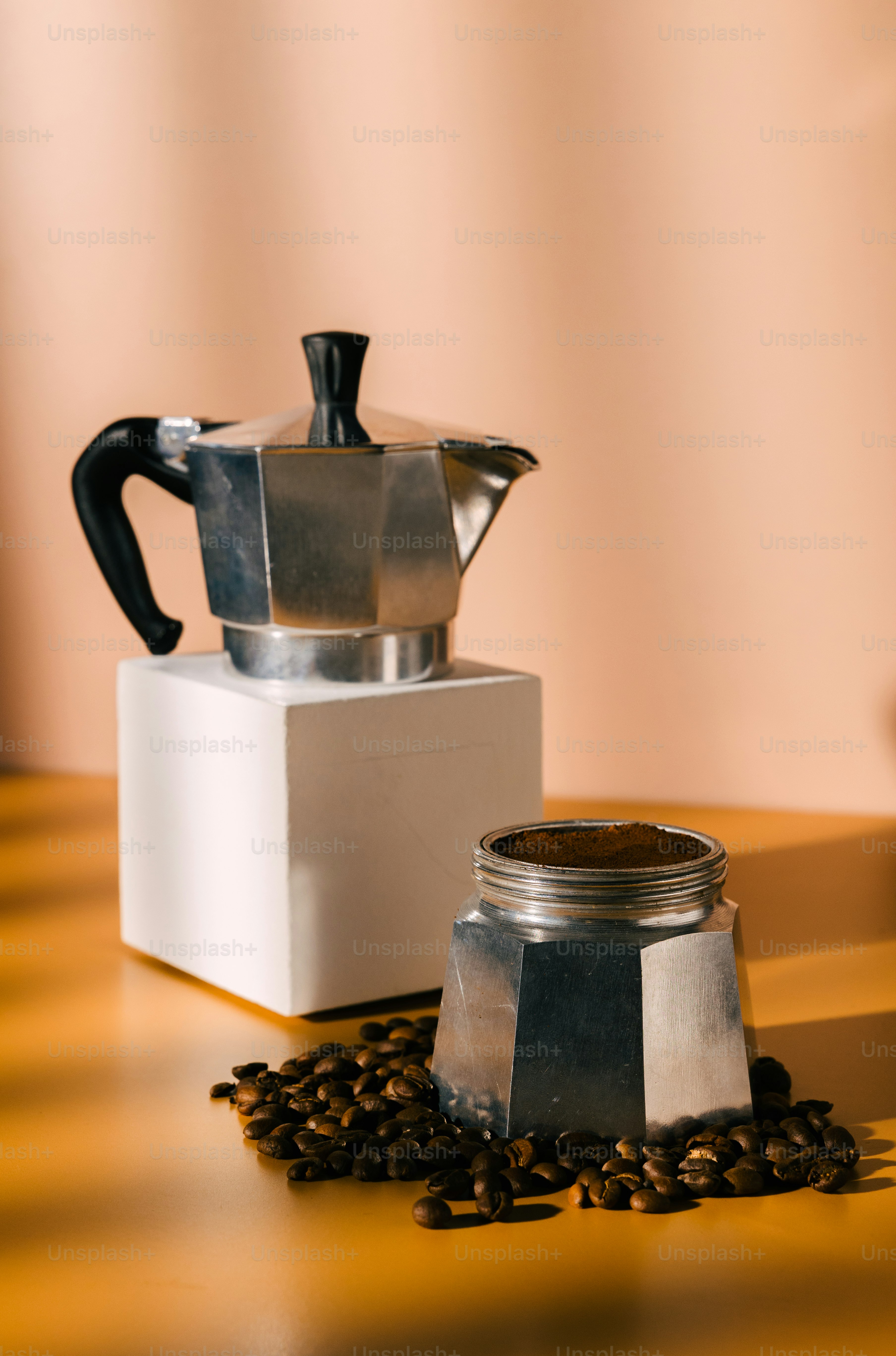 a coffee maker sitting on top of a wooden table