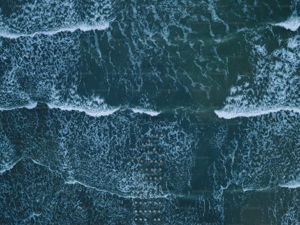 a bird's eye view of the ocean waves