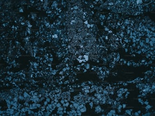 a close up of a black and blue surface