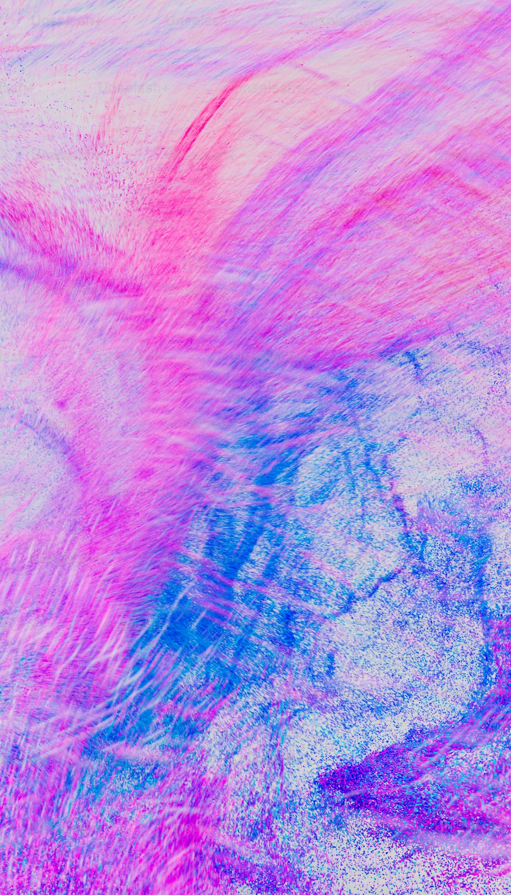a blurry image of a pink and blue background