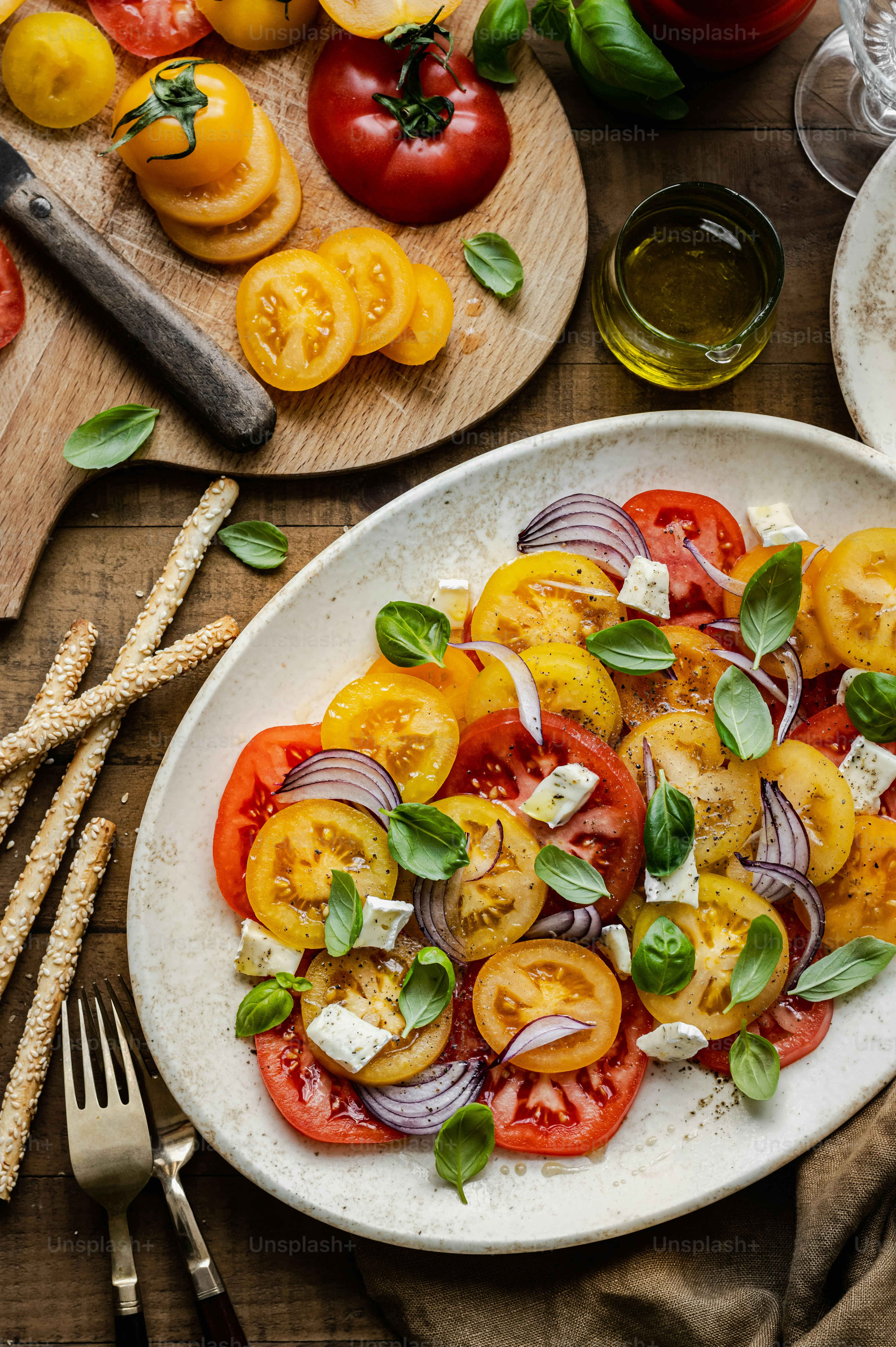 Mediterranean diet meal with fresh vegetables, olive oil, and fish