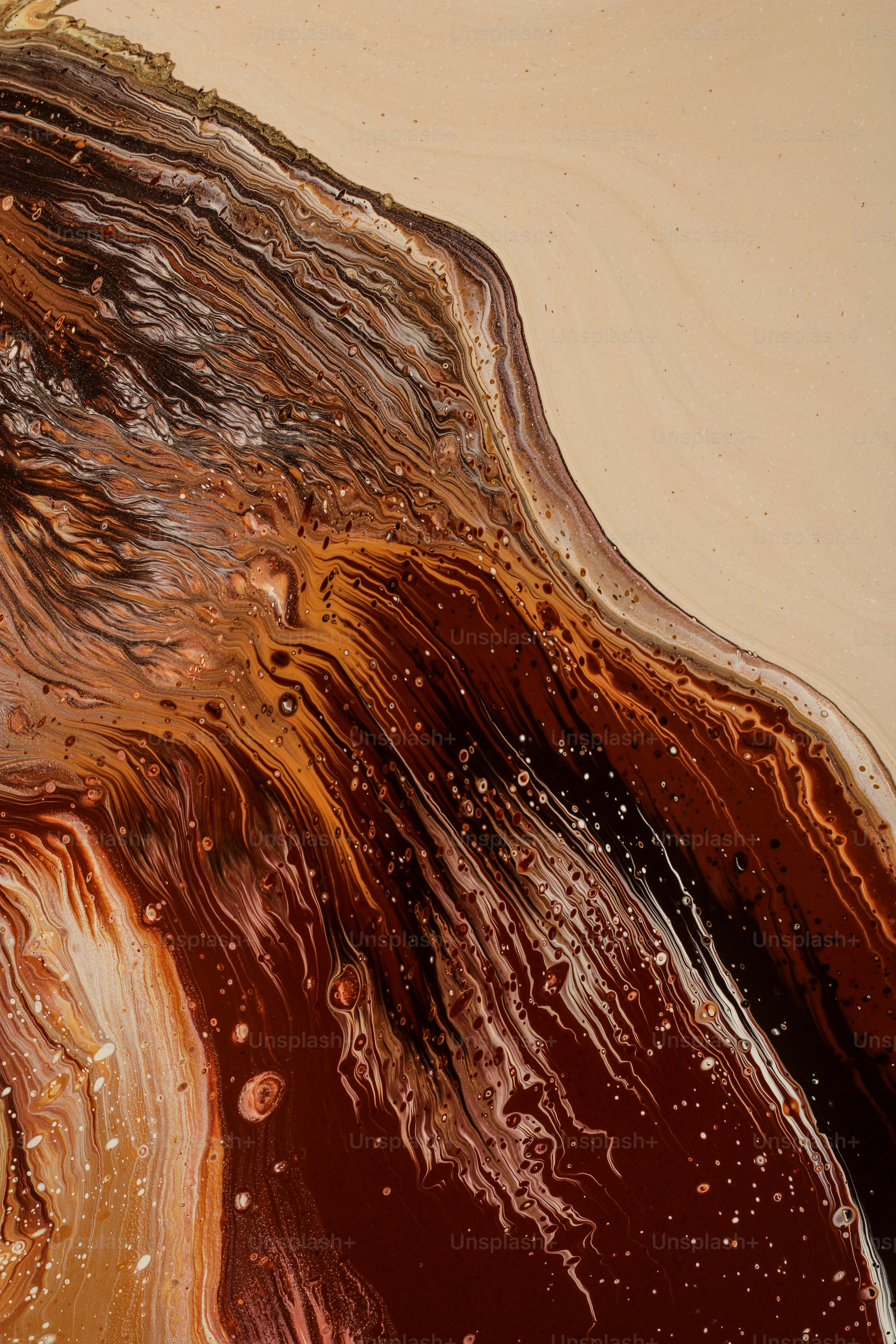 a close up of a brown and black substance