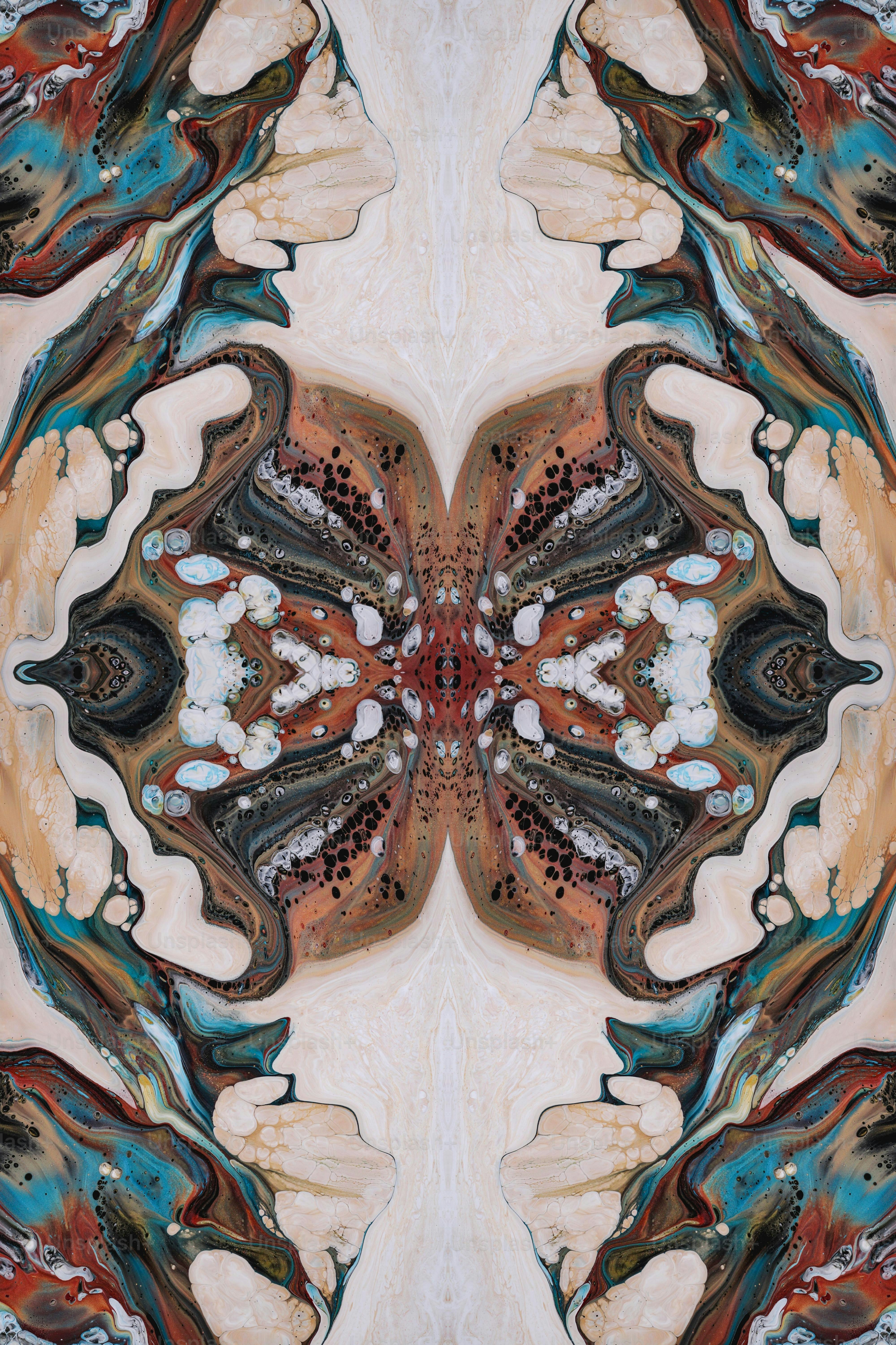 A picture of an abstract design made up of different colors and shapes ...
