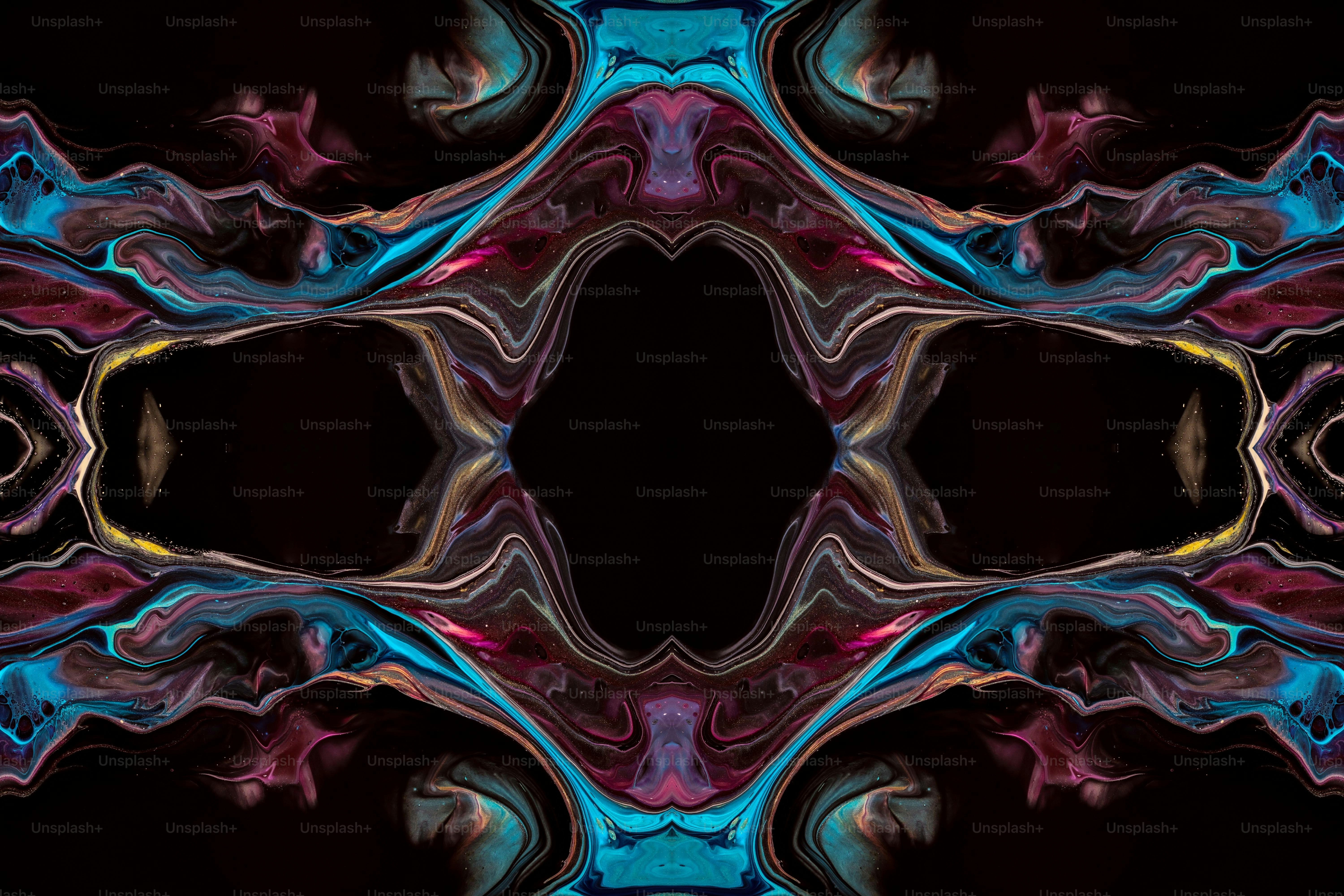 an abstract image of a black background with blue and pink colors